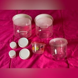 A set of 8 mixed-size travel containers+A surprise Gift